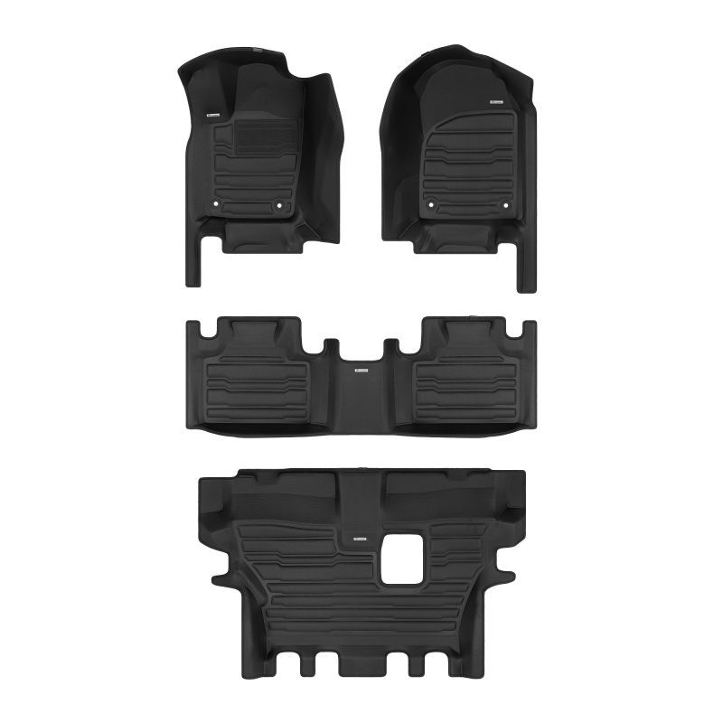 A set of black TuxMat car floor mats for Dodge Durango models.