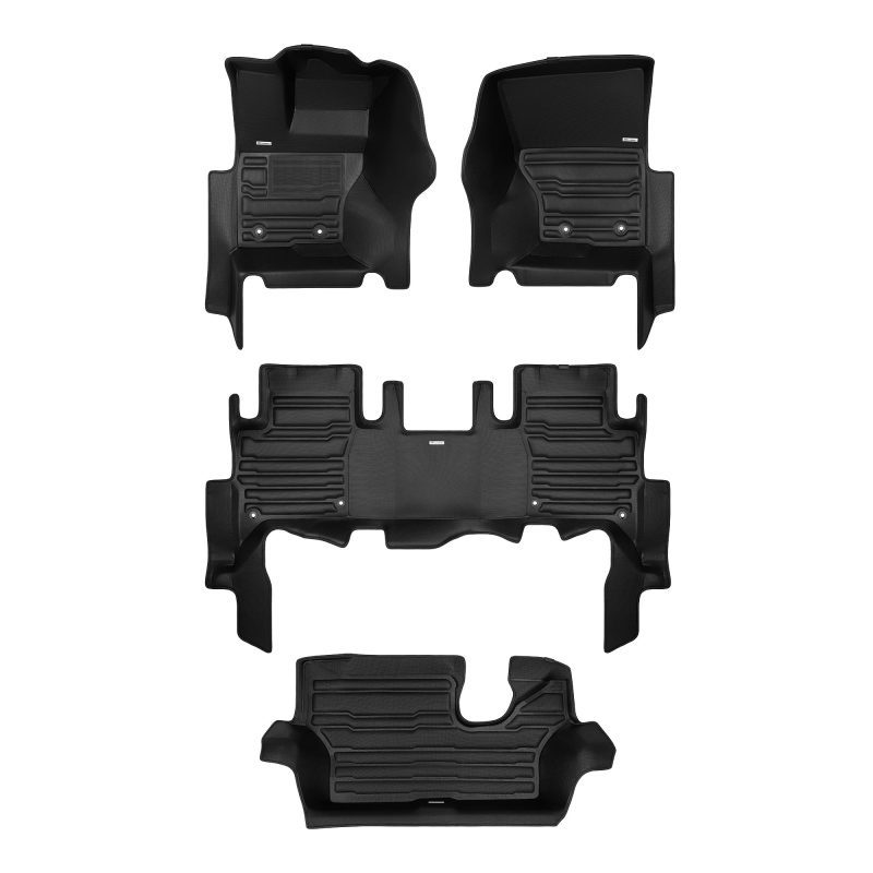 A set of black TuxMat car floor mats for Land Rover Discovery models.