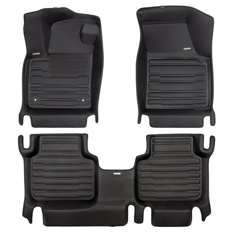 A set of black TuxMat car floor mats for Volkswagen Atlas models.