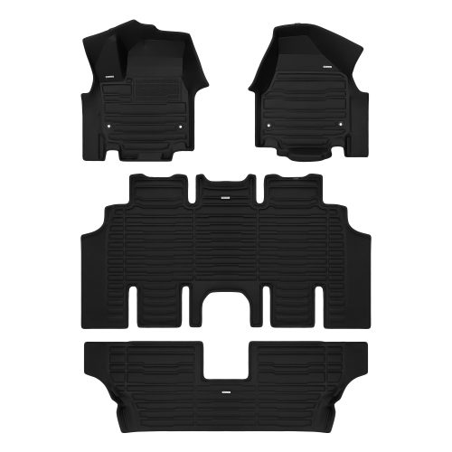 A set of black TuxMat car floor mats for Chrysler Grand Caravan models.