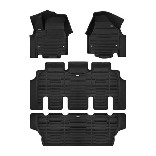 A set of black TuxMat car floor mats for Chrysler Grand Caravan models.