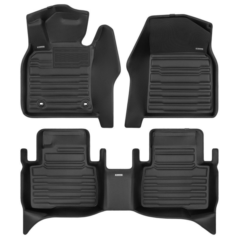 A set of black TuxMat car floor mats for Toyota Camry models.