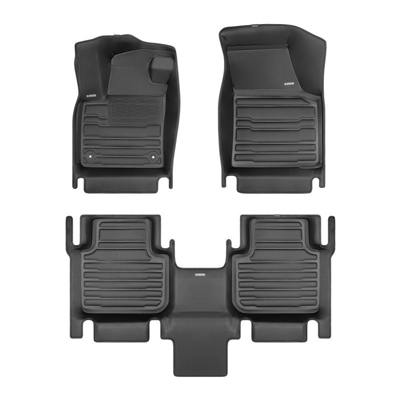 A set of black TuxMat car floor mats for Volkswagen Atlas models.