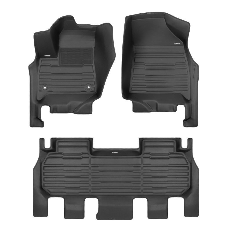 A set of black TuxMat car floor mats for Buick Enclave models.