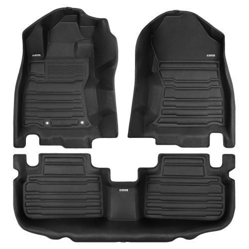 A set of black TuxMat car floor mats for Subaru Forester models.