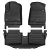 A set of black TuxMat car floor mats for Kia Niro models.