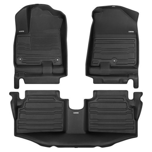 A set of black TuxMat car floor mats for Kia Niro models.