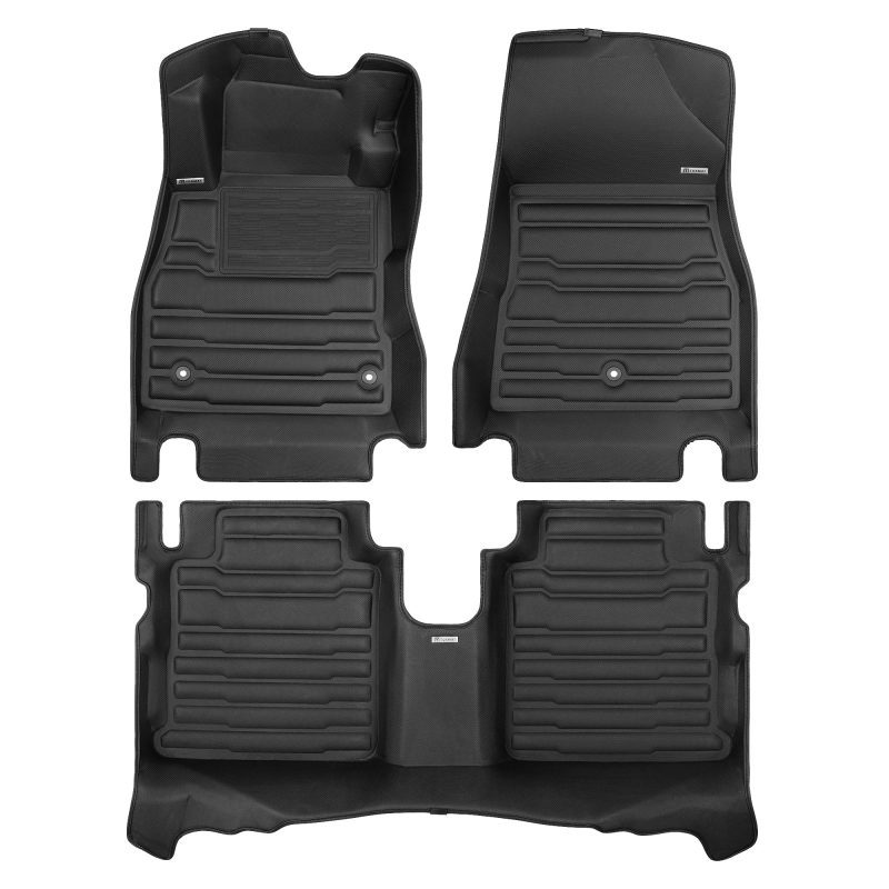 A set of black TuxMat car floor mats for Nissan Kicks models.