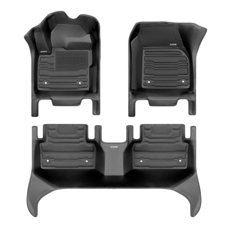 A set of black TuxMat car floor mats for Jaguar E-Pace models.