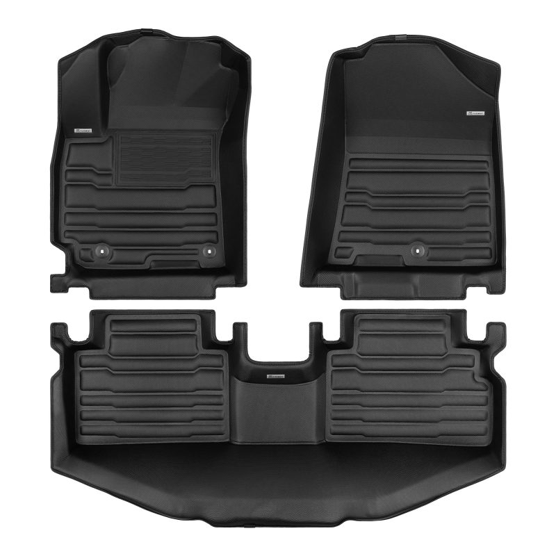 A set of black TuxMat car floor mats for Kia Soul models.