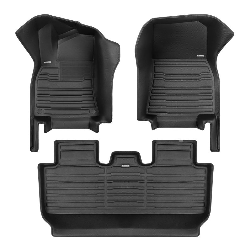 A set of black TuxMat car floor mats for Tesla Model Y models.