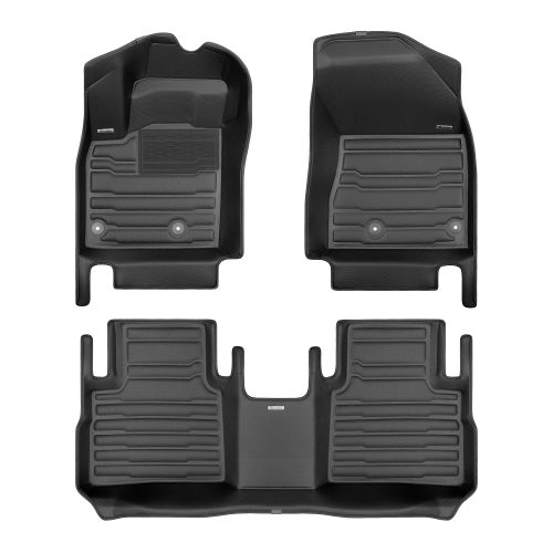 A set of black TuxMat car floor mats for Nissan Rogue models.