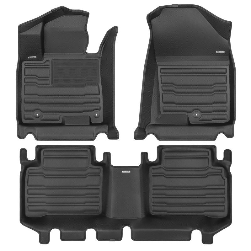 A set of black TuxMat car floor mats for Hyundai Tucson models.