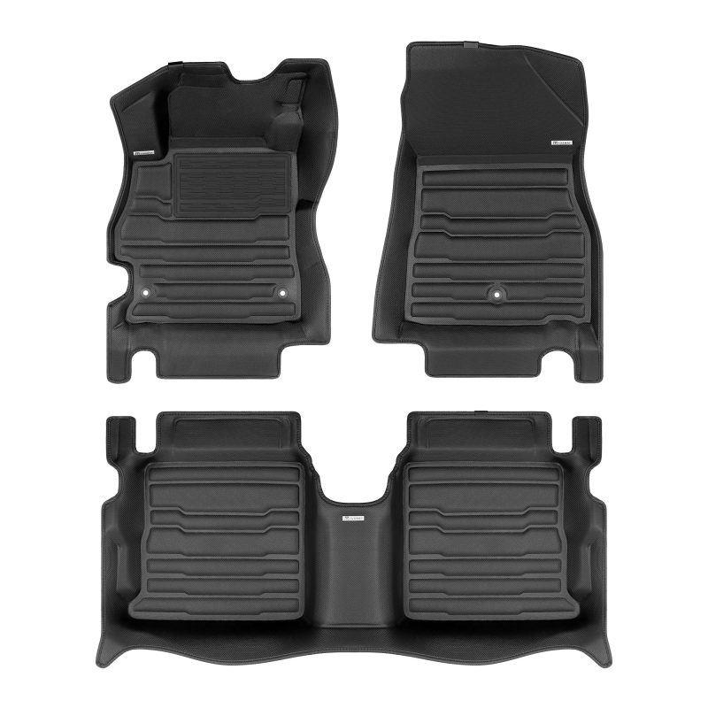 A set of black TuxMat car floor mats for Nissan Versa models.