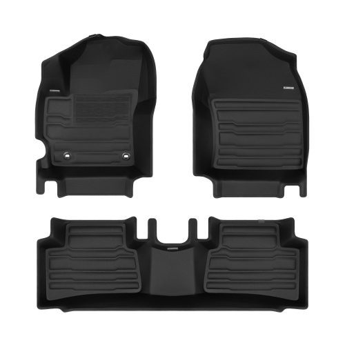 A set of black TuxMat car floor mats for Toyota Corolla Cross models.