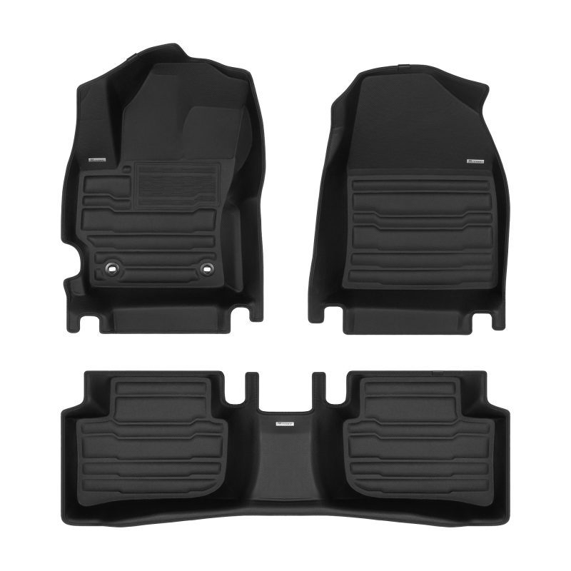 A set of black TuxMat car floor mats for Toyota Corolla Cross models.