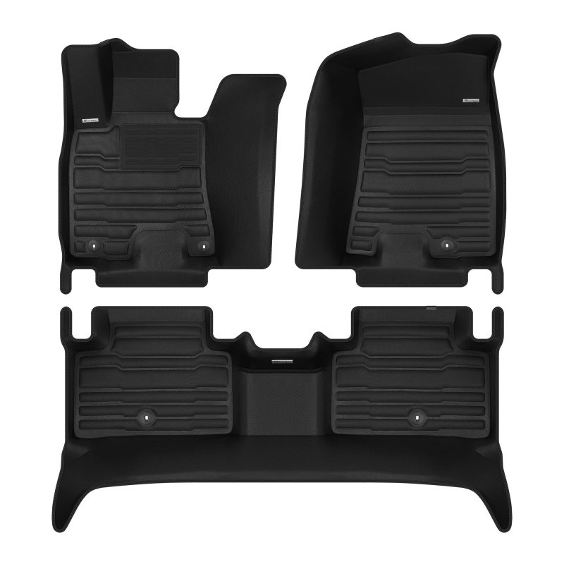 A set of black TuxMat car floor mats for Genesis GV70 EV models.