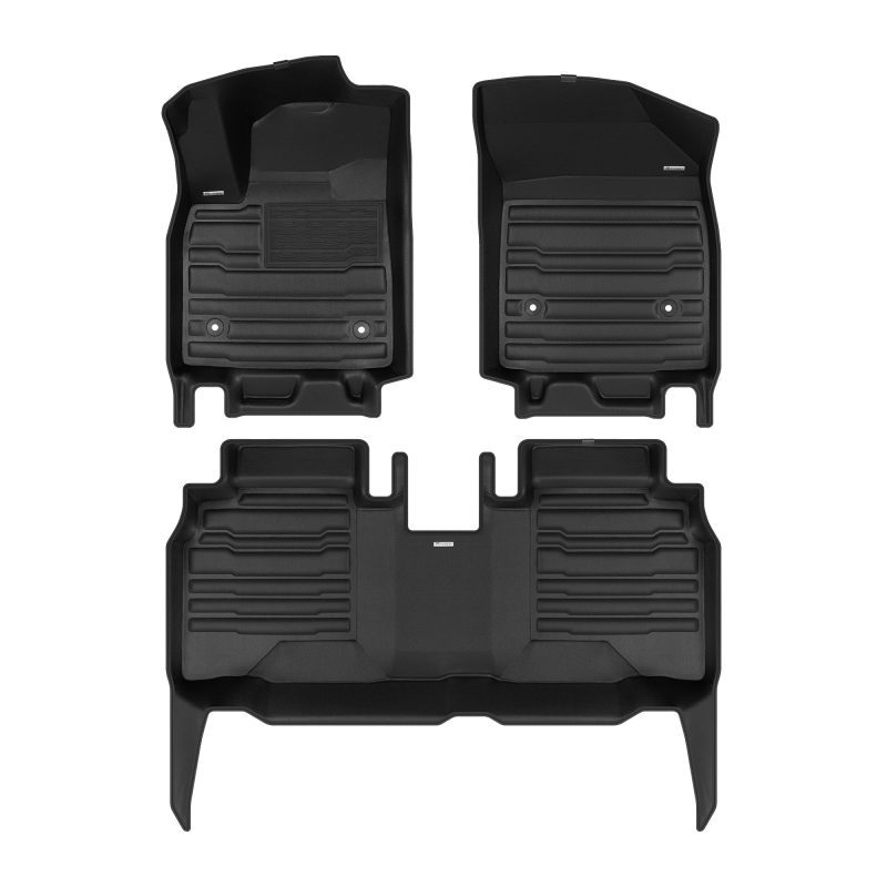 A set of black TuxMat car floor mats for Cadillac Lyriq models.