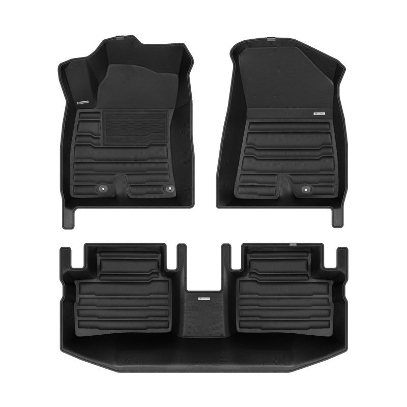 A set of black TuxMat car floor mats for Kia Niro models.