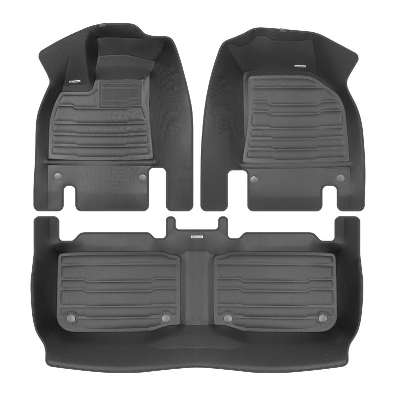 A set of black TuxMat car floor mats for Lucid Air models.