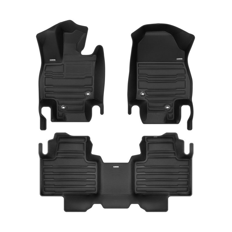 A set of black TuxMat car floor mats for Toyota Grand Highlander models.