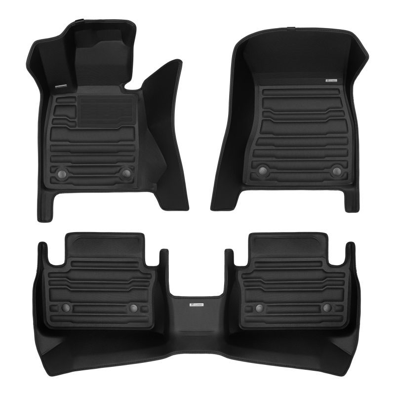 A set of black TuxMat car floor mats for BMW i5 models.