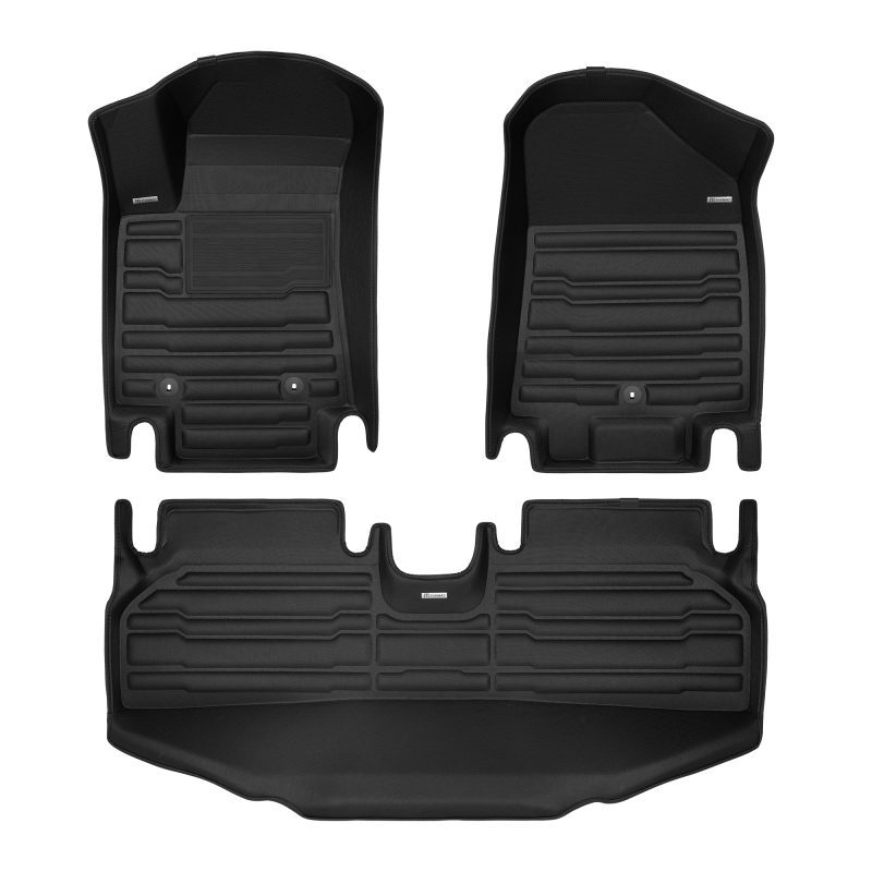 A set of black TuxMat car floor mats for Hyundai Kona models.