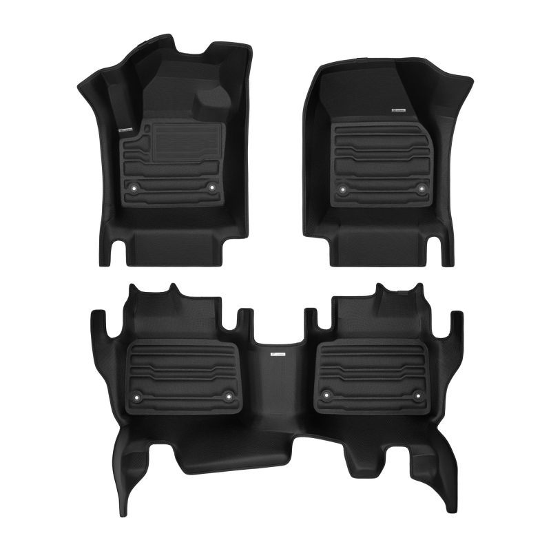 A set of black TuxMat car floor mats for Land Rover Discovery Sport models.