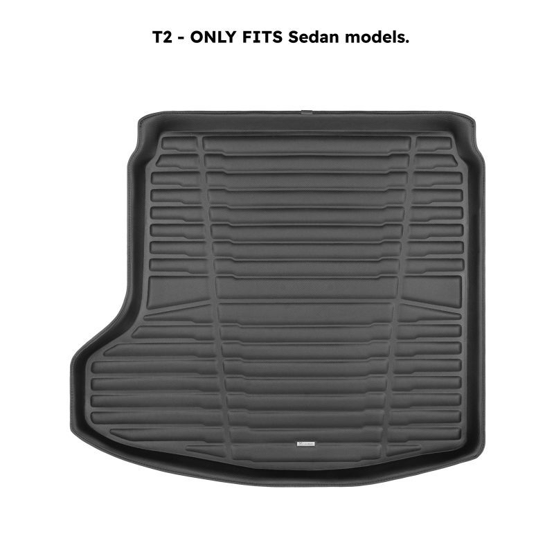 A set of black TuxMat trunk mats for Mazda 3 models.